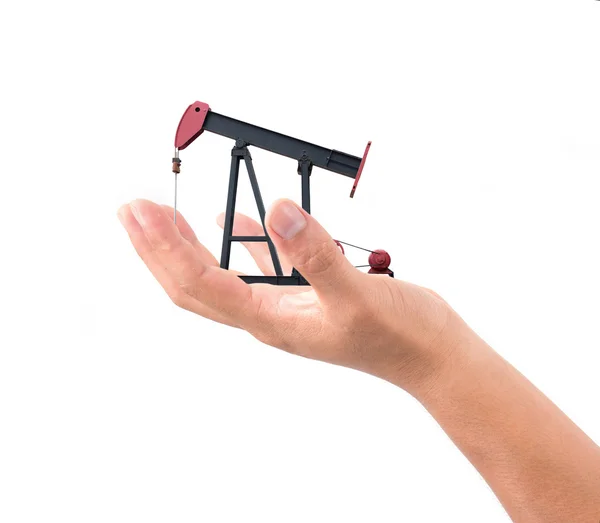 Hand hold pumpjack — Stock Photo, Image