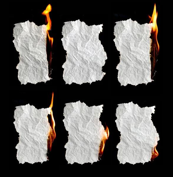 Paper burning on black background — Stock Photo, Image