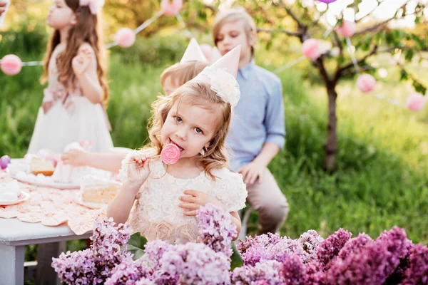 Happy Birthday Little Girl Making Wish Blowing Candles Cake Pink — Stock Photo, Image