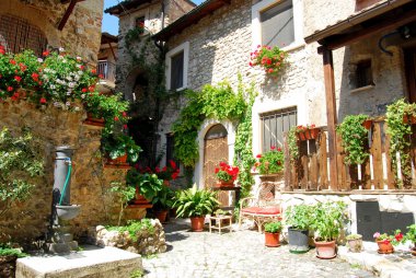 A characteristic corner of the village of Assergi in the Abruzzi clipart
