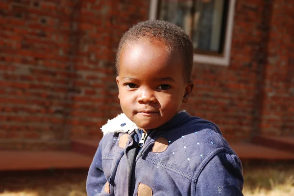 August 2014 - Africa -Tanzania - Moments of everyday life in the Village of Pomerini  affected by AIDS. Between a past of misery and poverty and a future of hope contained in children's eyes — Stock Photo, Image