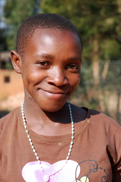 Los niños africanos que sufren de SIDA seguido por la organización sin fines de lucro — Foto de Stock