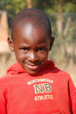 Afrikalı çocuklar tarafından kar amacı gütmeyen takip AIDS acı 