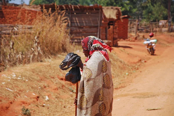 "08.28.2014"-Old African woman in her traditional dress-Tanzania — Stock Photo, Image