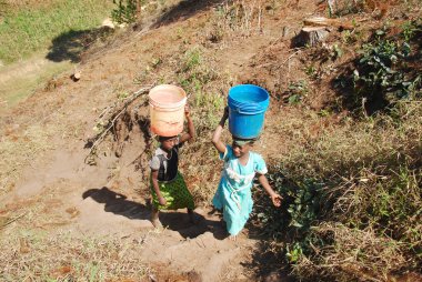 The precious water in the region of Kilolo, Tanzania Africa 35 clipart