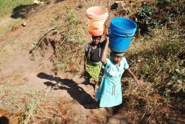 The precious water in the region of Kilolo, Tanzania Africa 37 clipart