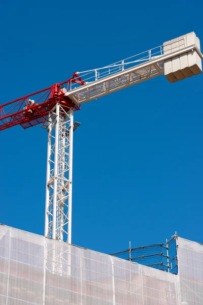 Construction Site with Red and White Crane — Stock Photo, Image