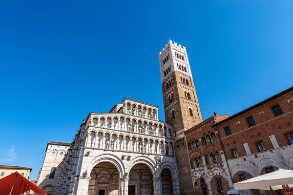 Main facade of the Medieval Cathedral of San Martino (Saint Martin), in Romanesque Gothic style, XI - XII century. Piazza San Martino, Tuscany, Italy, Europe.