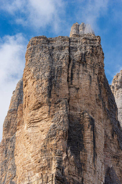 Rock north face of the Drei Zinnen or Tre Cime di Lavaredo (three peaks of Lavaredo), the famous mountain peaks of Dolomites, UNESCO world heritage site, Trentino-Alto Adige, Veneto, Italy, Europe.