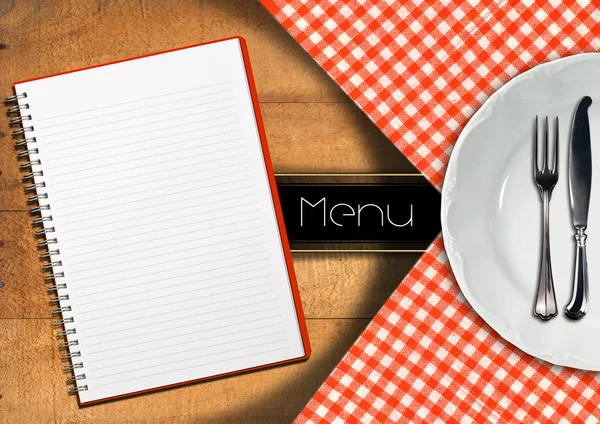 Menu com caderno e placa branca — Fotografia de Stock