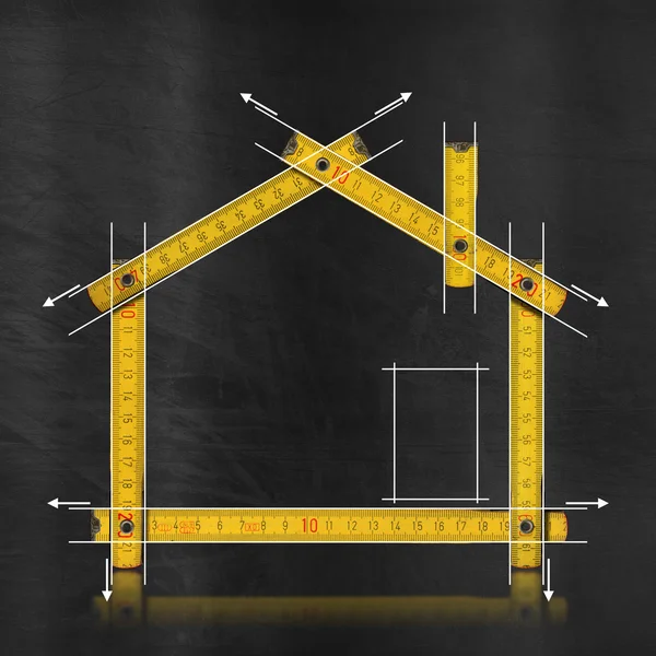 Projeto da casa - Medidor de madeira amarelo — Fotografia de Stock