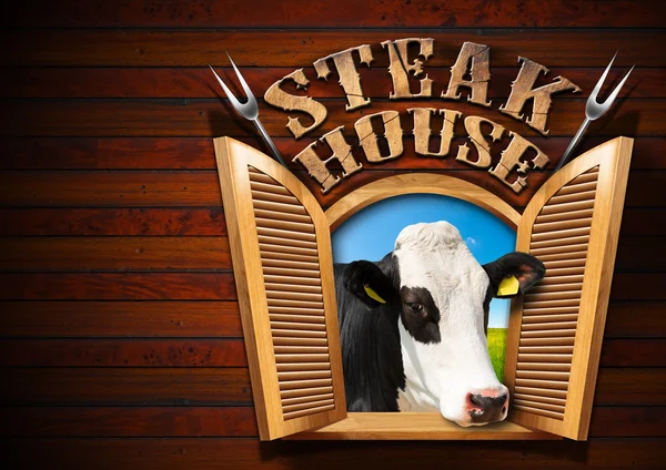 Casa de bife - Janela com vaca — Fotografia de Stock