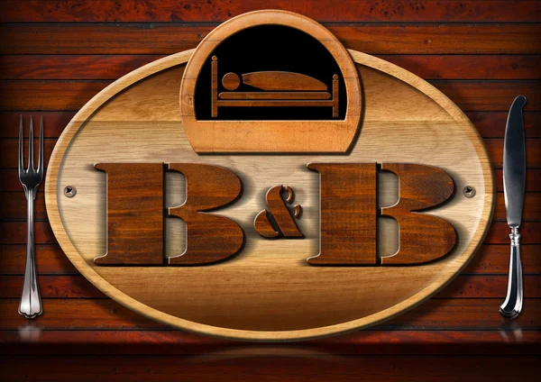 Bed and Breakfast - znamení s manželskou postelí a příbory — Stock fotografie