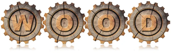 Símbolo de madeira com quatro engrenagens de madeira — Fotografia de Stock