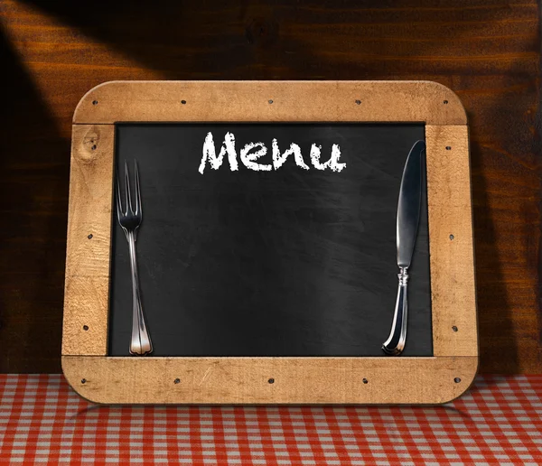 Menu de quadro negro na mesa — Fotografia de Stock