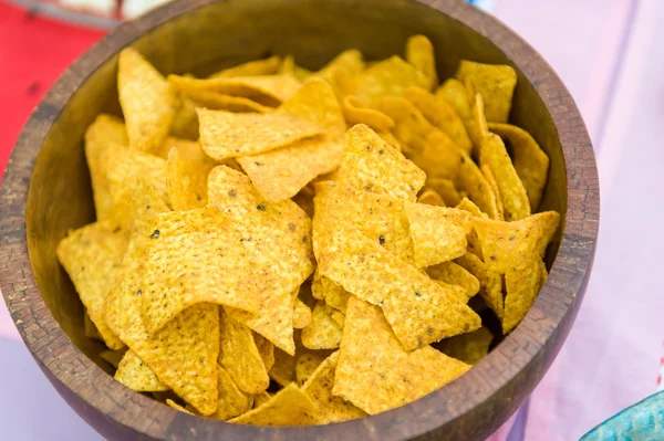 Tortilla corn chips in wooden bowl — Stock Photo, Image