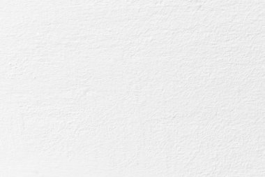 Beyaz beton duvar dokusu arka plan. Eskimemiş, alçı beyazı, beton duvar dokusu arka planı. Güneşin altında pürüzlü bir duvar..