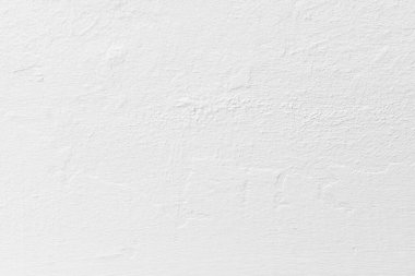 Beyaz beton duvar dokusu arka plan. Eskimemiş, alçı beyazı, beton duvar dokusu arka planı. Güneşin altında pürüzlü bir duvar..