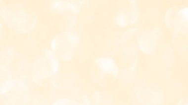 Altın sarısı bej krem ve beyaz ışık parıltılı bokeh desenli arka plan. Yeni Yıl, Noel ve tüm kutlama geçmişi kavramları.