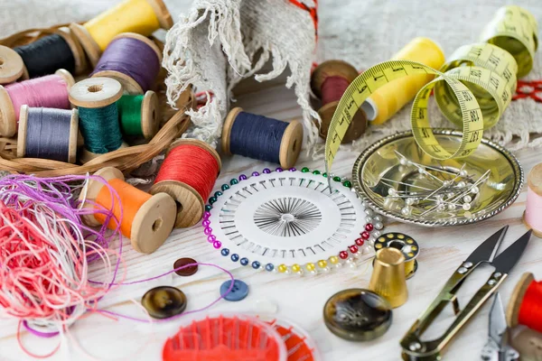 Handicraft items, threads, sewing needles.