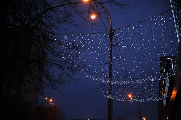 Décoration de rue de Noël la nuit Photos De Stock Libres De Droits