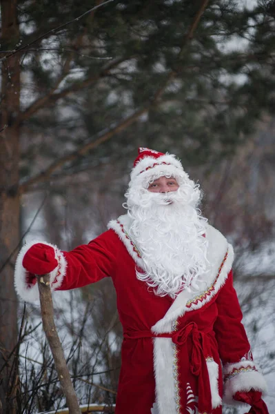 Santa claus outdoors in winter on a sunny day — Stock Photo, Image