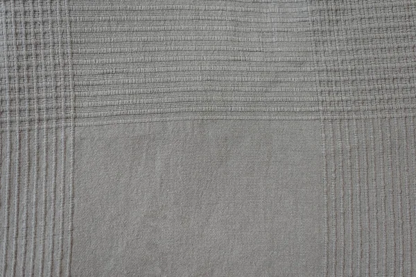 Текстура коричневой хлопчатобумажной полосатой клетчатки. Крупный план домашнего текстиля. — стоковое фото