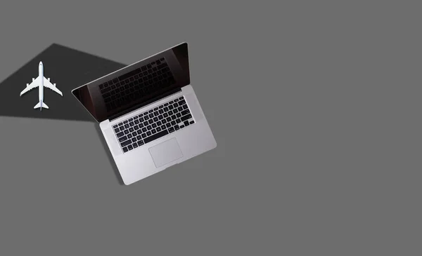 Modern Laptop Computer Plane Gray Background — Stock Photo, Image