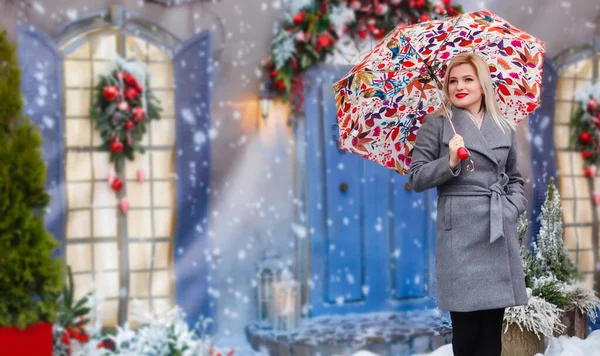 Snow Falling On Woman Under Umbrella