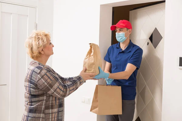 Elderly Woman Stays Home Food Delivery Medical Mask — Stock Photo, Image