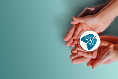 Yetişkin ve çocuk ellerinde akciğer, dünya verem günü, tütün günü yok, akciğer kanseri, koronavirüs covid-19, pulmoner hipertansiyon, pnömoni, copd, eko hava kirliliği, organ bağışı konsepti