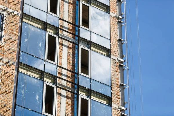 facade window installation construction site