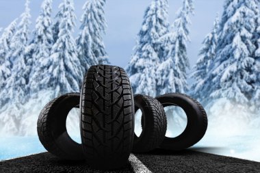 Kış arka planında dört kış lastiği