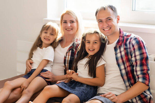 Young family being playful at home