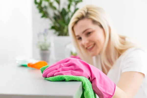 Woman Protective Gloves Smiling Wiping Dust Using Spray Duster While — Stock Photo, Image