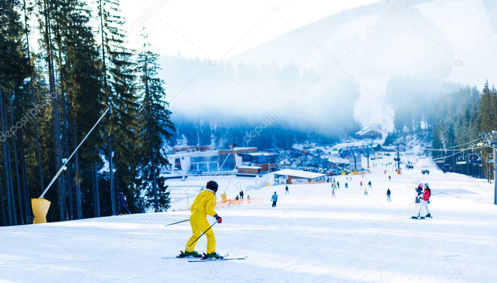 Woman skier enjoy in winter sunny day, holiday
