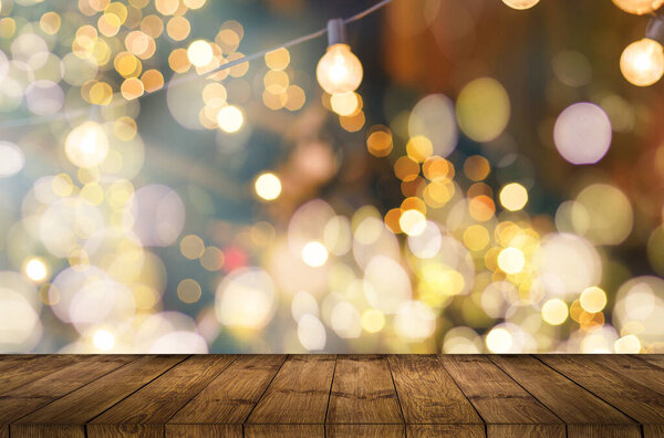 Empty wooden table in front of abstract blurred background of coffee shop . can be used for display or montage your products.Mock up for display of product.