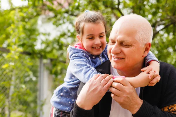 Portrait Small Girl Senior Grandfather Backyard Garden Standing — Stock Photo, Image