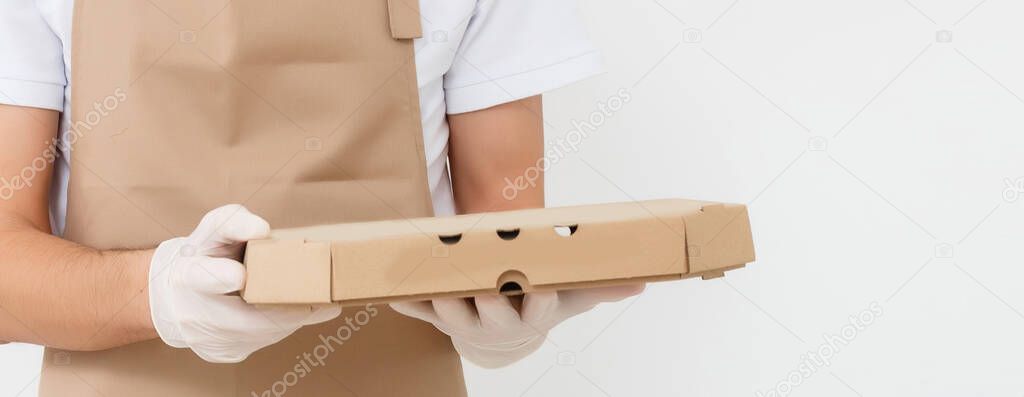 Diverse of paper containers for takeaway food. Delivery man is carrying. High quality photo