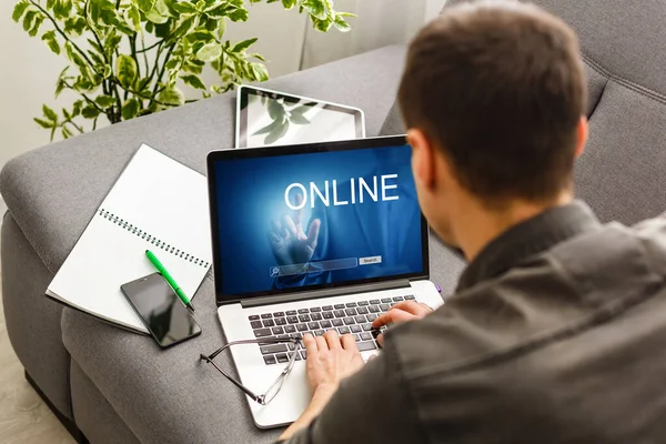 Young businessman using his laptop, close up — Stock Photo, Image