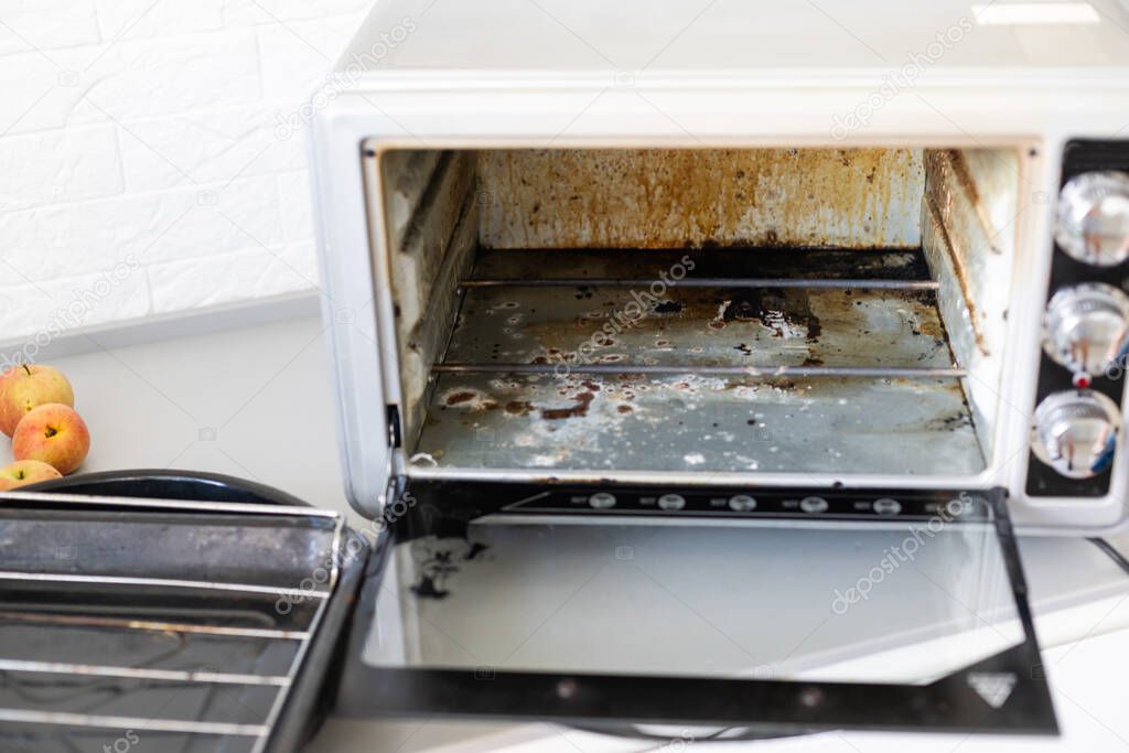 dirty oven, electric oven in fat