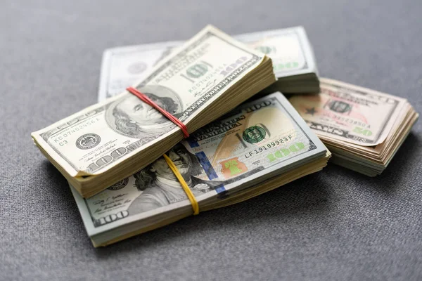 Dollaro americano USA confezioni su sfondo denaro. Concetto finanziario — Foto Stock