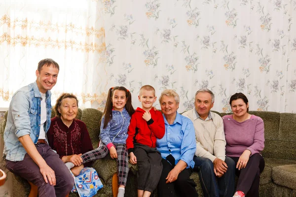 Happy big family on the sofa at home — Stock Photo, Image