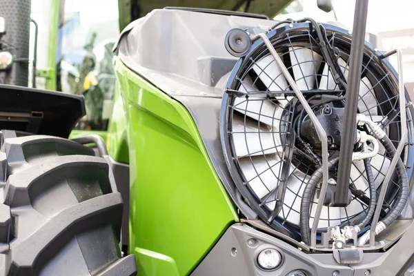 Part of agriculture machine close up with hydraulic system, steel tubes, industrial tools equipment, tractor or harvester, toned — Stock Photo, Image