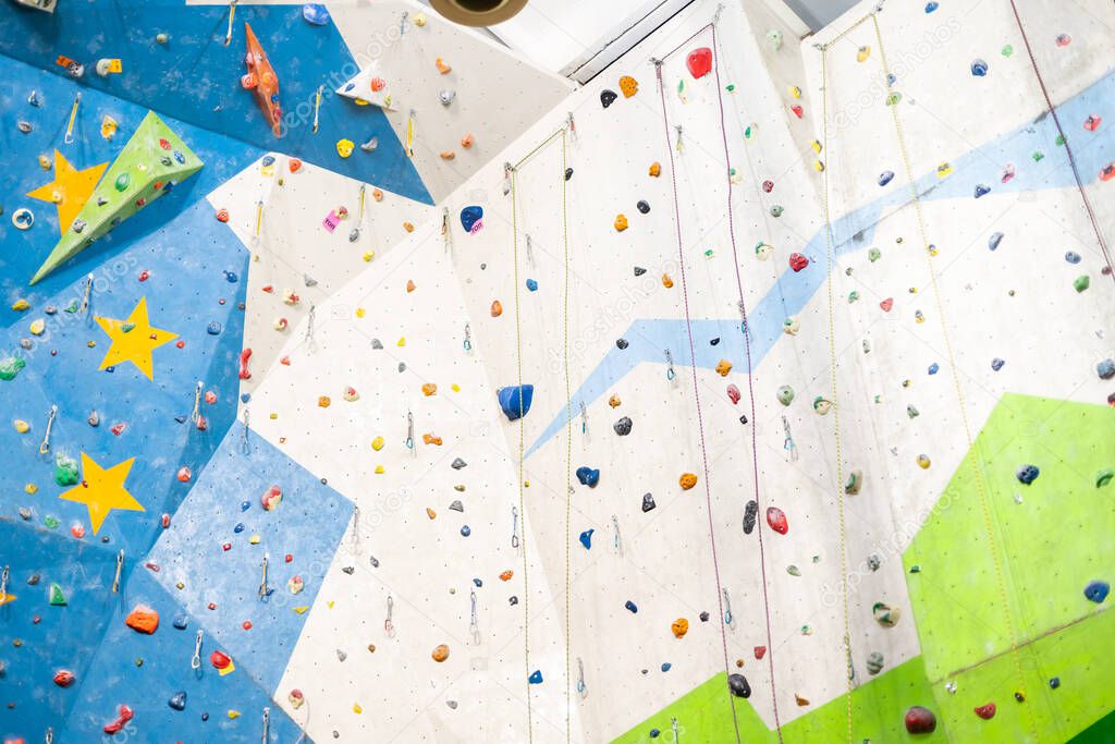 A rock climbing wall for background practical wall in gym