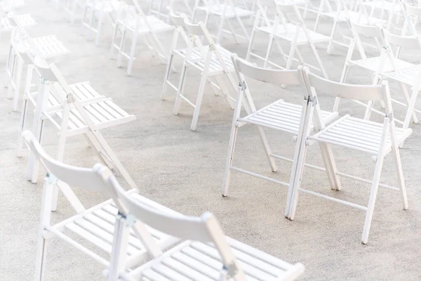 Social distancing during Covid or Coronavirus crisis, chairs keeping distance during a show, concert or exhibition, theater or cinema — Stock Photo, Image