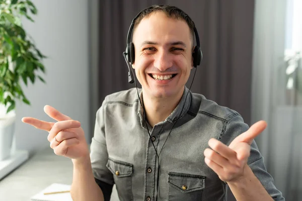 Head shot portrait happy smiling man wearing headset show thumbs up, like, satisfied student, client recommend online course, earning language, excited freelancer using laptop, look at camera — Stock Photo, Image