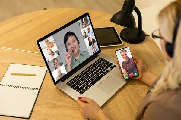 Woman and team on laptop screen talking and discussion in video conference. Working from home, Working remotely, Self-isolation. — Stock Photo, Image