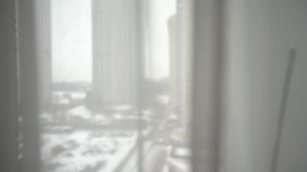 Business woman opening curtains in hotel room looking out window at fresh new day successful independent female planning ahead on cloudy morning — Stock Video