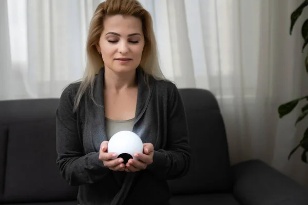 A fortune teller gazes into her ball — Stock Photo, Image